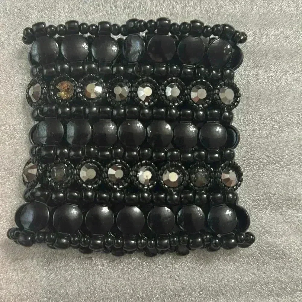 BEBE STONE AND CRYSTAL MULTI LEVEL STRETCH BRACELET